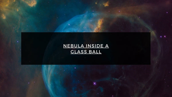 Nebula Inside a Glass Ball title over a colorful cosmic background