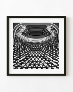 Rounded white bands above a dense triangular grid inside SAHMRI in Adelaide, in black and white.