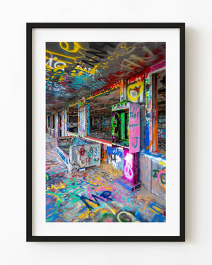 Bright graffiti fills an abandoned interior at VW Slug Bug Ranch in Texas