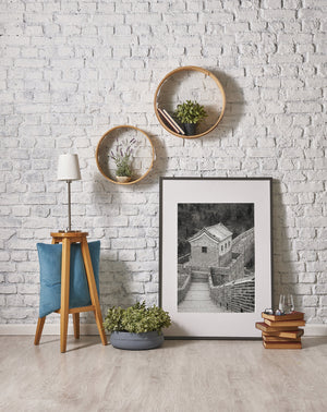 Layered walls and worn stone steps frame a Great Wall guard station
