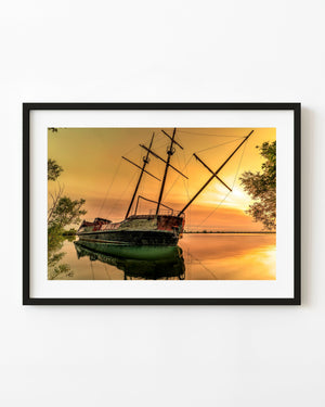Sunrise illuminating Lake Ontario shipwreck