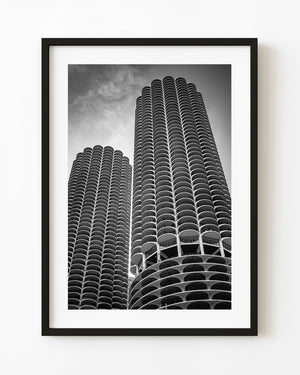 Black and white photograph of Marina City Towers in Chicago viewed from below