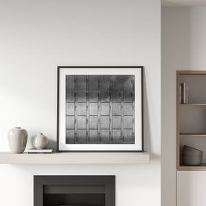 Black and white study of locker-door textures and orderly vertical rows