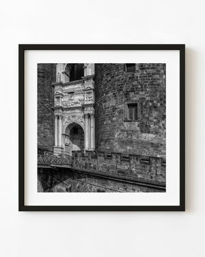 Castel Nuovo entrance between stone towers in Naples in black and white