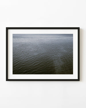 Fine ocean ripples off Northern Ireland in muted blue and grey