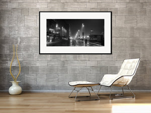 Misty black and white night scene along the Aker Brygge waterfront