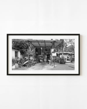 Open-air garage and bicycle in rural Cuba
