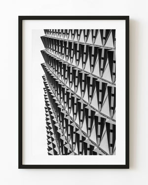 SAHMRI facade with repeating triangular forms in black and white