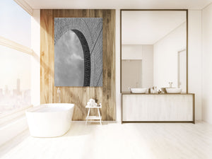 Repeating brick patterns and a curved opening in black and white