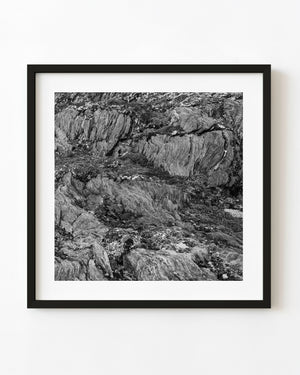 Black and white close-up of rugged mountain rock textures in Ushuaia, Argentina