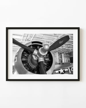 WWII American fighter plane radial engine and propeller in black and white