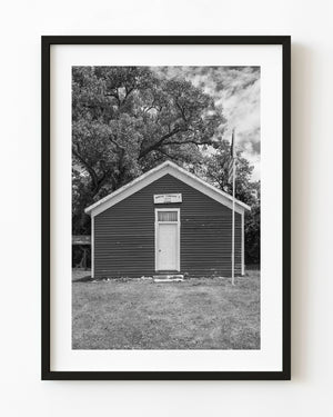 Wabash Township 1874 schoolhouse beneath a leafy tree in black and white.