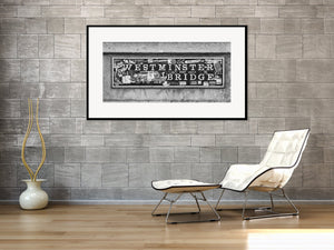 Weathered Westminster Bridge sign and sticker collage in monochrome