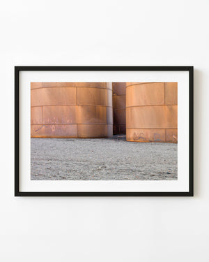Rusted orange oil storage tanks at Whalers Bay Antarctica