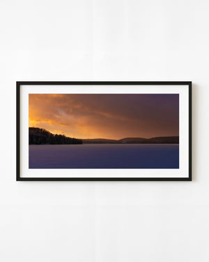Winter sunset over a frozen Haliburton lake in Ontario