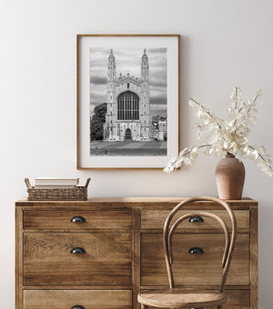 Cambridge chapel entrance framed by ornate stonework and towers