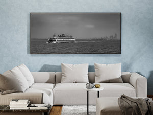 Black and white maritime photograph of the Staten Island Ferry underway.